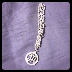 Silver bracelet with M pendant